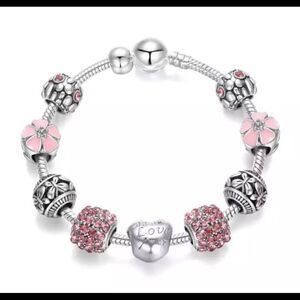 TRENDY PINK 9 PIECE CHARM BRACELET‎